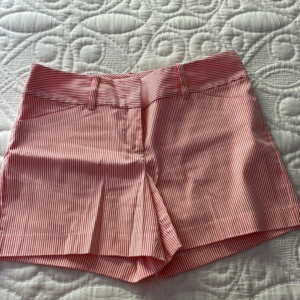 Seersucker salmon colored shorts.